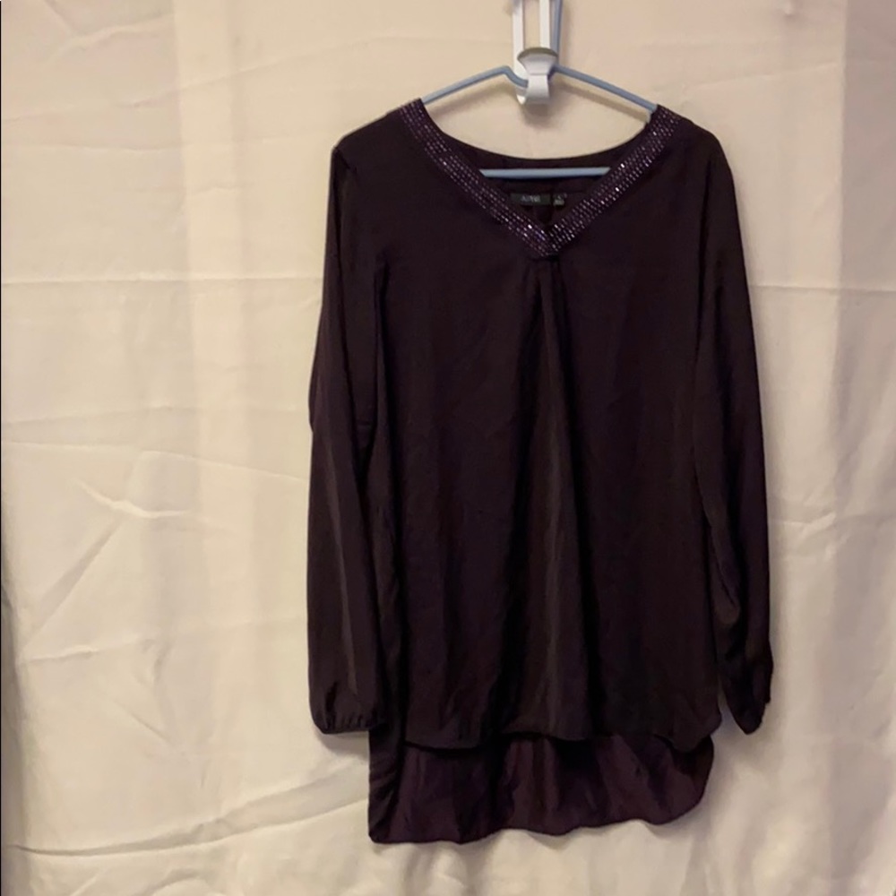 Dark purple blouse.
